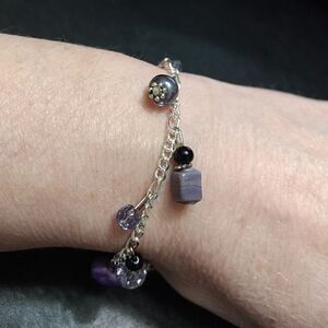 Silver tone and purple bracelet